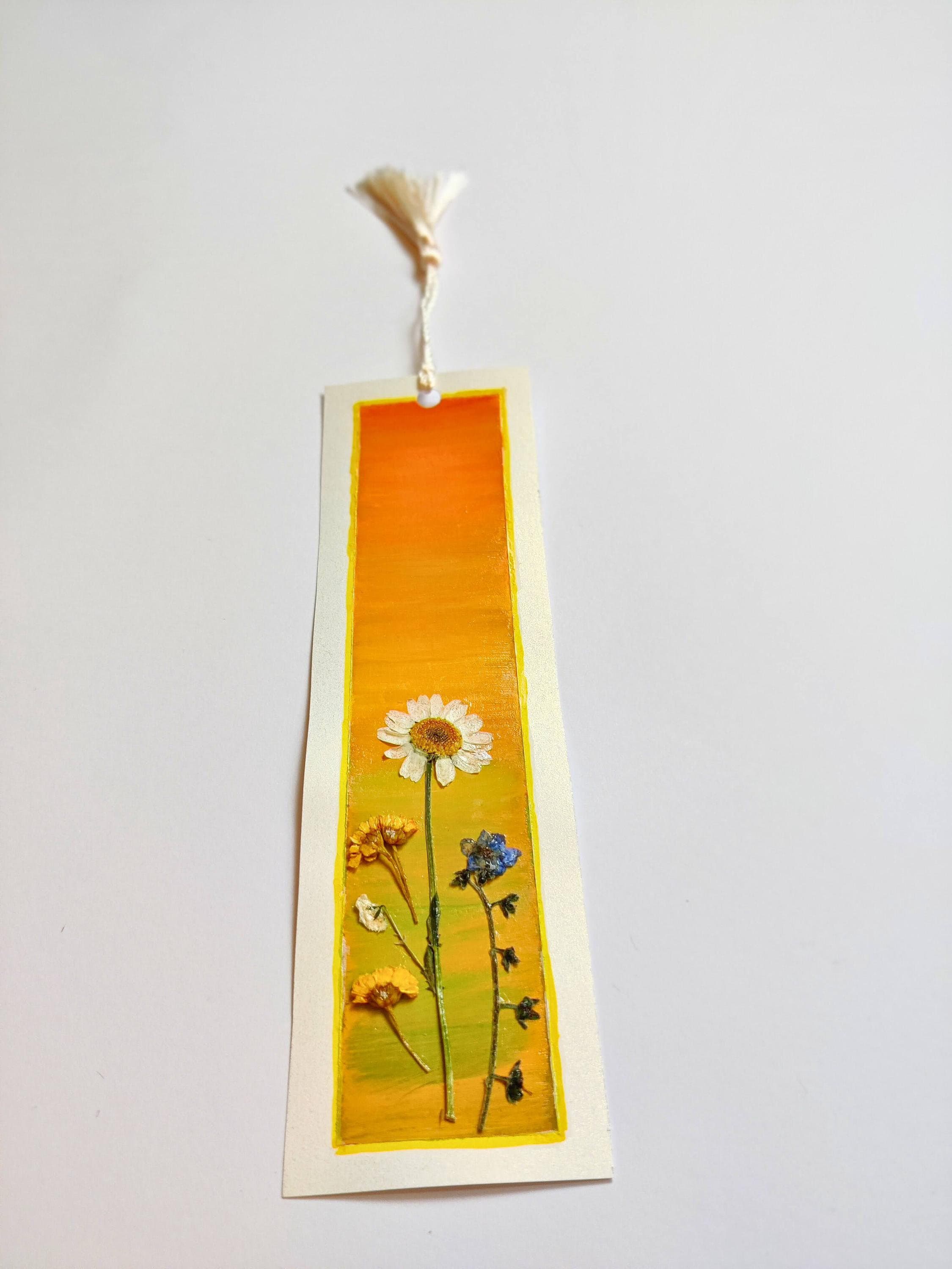 floral bookmark, pressed flowers bookmark, yellow sunset bookmark, handmade bookmarks, unique bookmarks, 2x6 bookmark, flower art, nature-inspired bookmark, gift for book lovers, decorative bookmark, botanical bookmark, colorful bookmarks, eco-friend