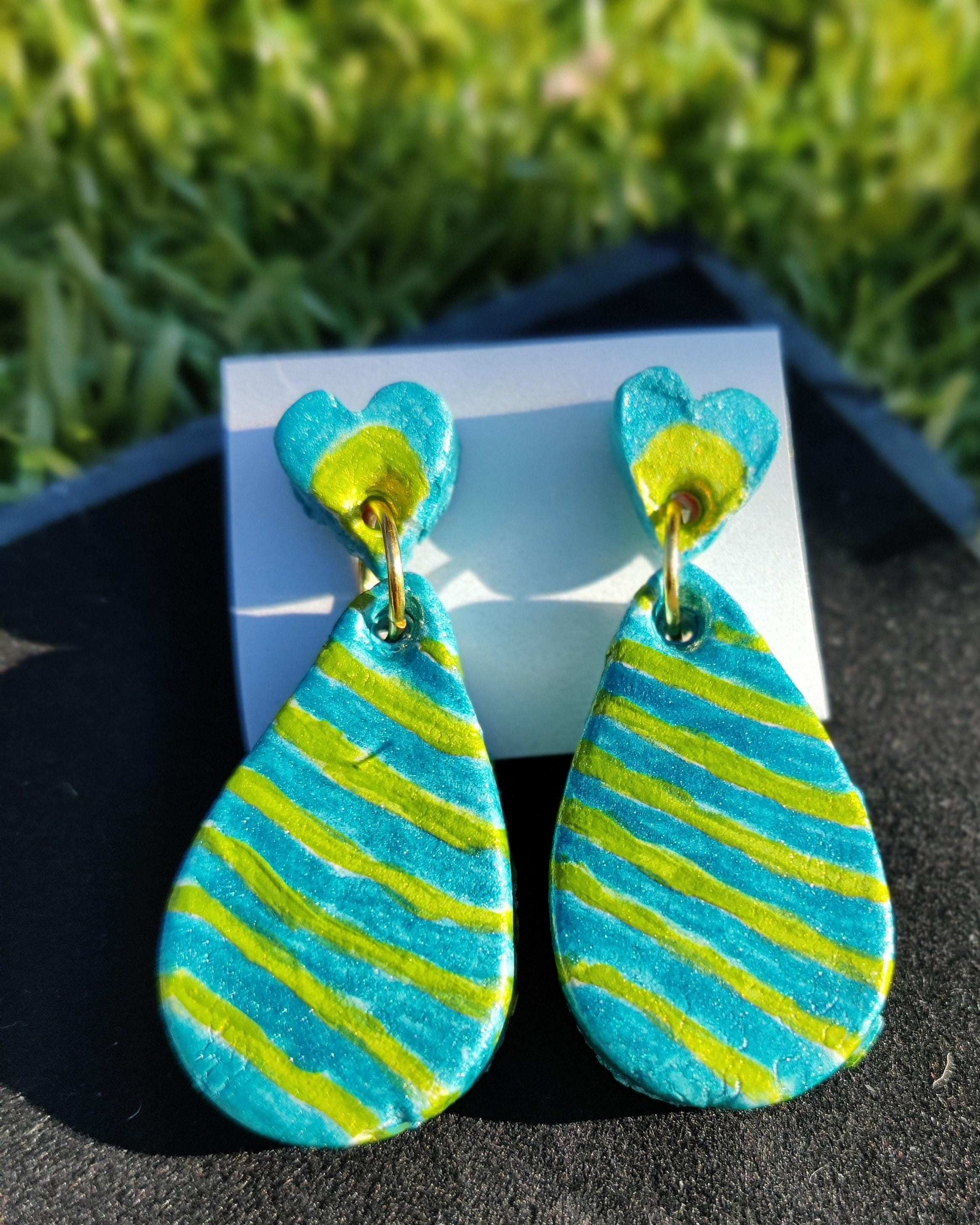 Handmade Clay Earrings | Striped Heart & Teardrop Design | Green and Peacock Blue |  Handmade Jewelry  
Colorful Clay Earrings  | Lightweight Dangle Earrings | Green Blue Earrings
Unique Accessories
Boho Style Jewelry
Artisan Earrings
Statement Jewel